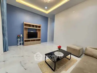 Modern living room with sleek furniture and elegant lighting