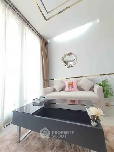 Elegant living room with modern decor and natural light