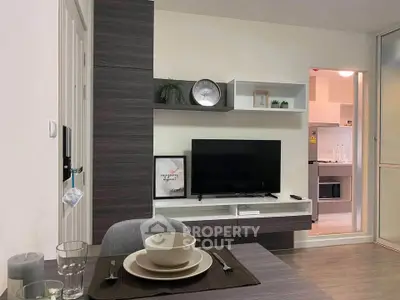 Modern living room with stylish decor and open kitchen layout