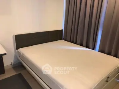 Cozy bedroom with modern design and ample natural light