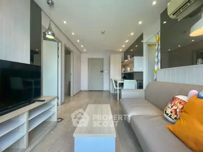 Modern living room with sleek design and cozy ambiance