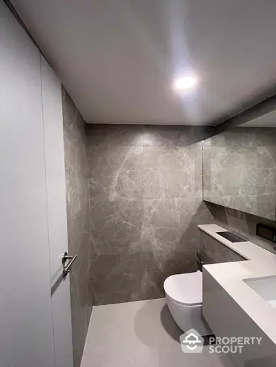 Modern bathroom with sleek design and elegant marble tiles