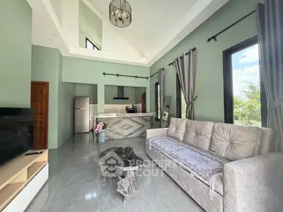 Spacious modern living room with high ceilings and stylish decor