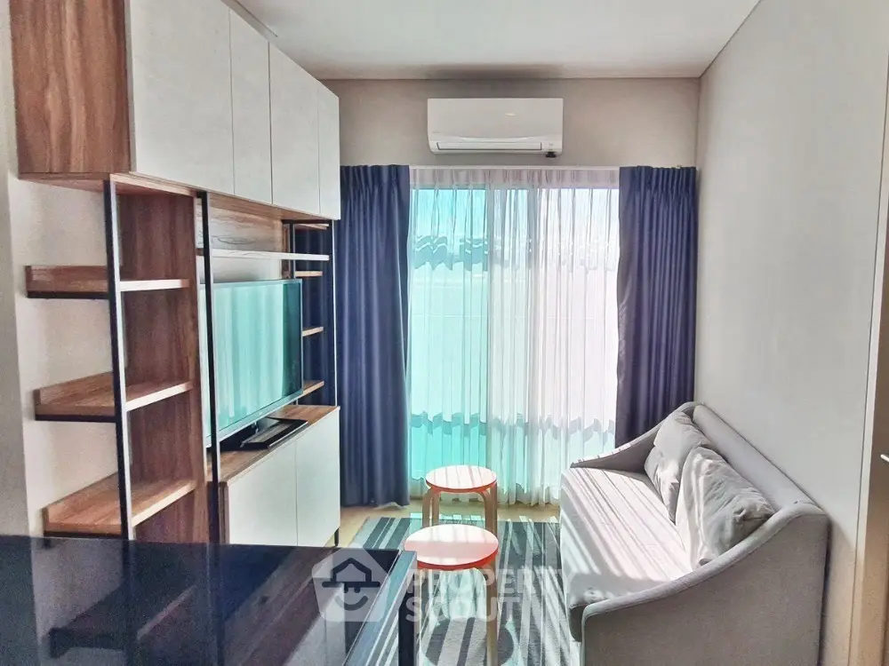 Modern living room with sleek furniture and natural light