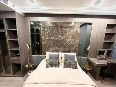 Luxurious bedroom with elegant decor and built-in storage solutions