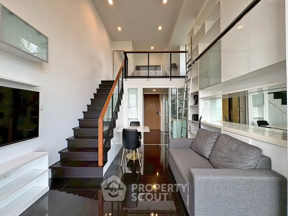 Modern loft apartment with sleek design and mezzanine bedroom