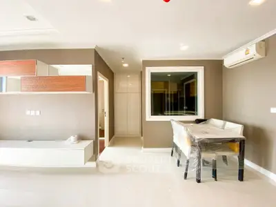 Modern living room with air conditioning and stylish furniture in a bright apartment.