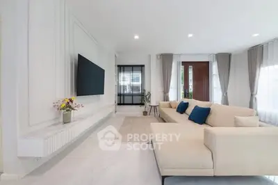 Spacious modern living room with elegant decor and large sofa