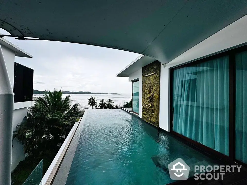 Luxurious rooftop infinity pool with stunning ocean view and modern architecture