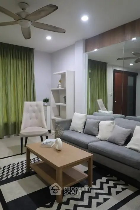 Modern living room with stylish decor and cozy seating area