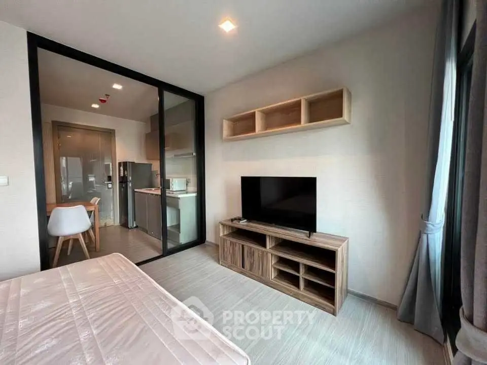 Modern studio apartment with open kitchen and cozy living area