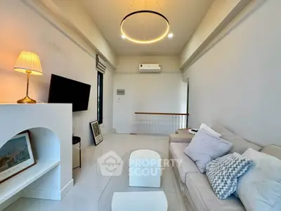 Modern living room with stylish decor and cozy seating area