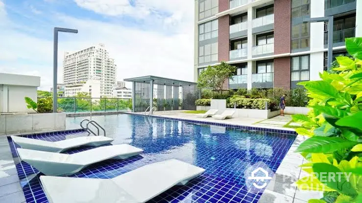 Luxurious condominium with modern pool and city view