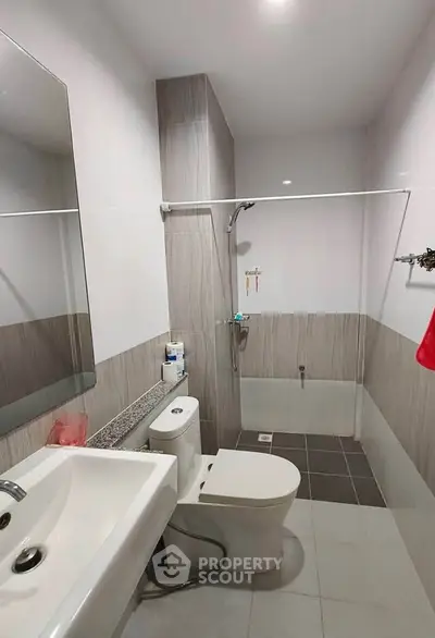 Modern bathroom with sleek design and spacious shower area
