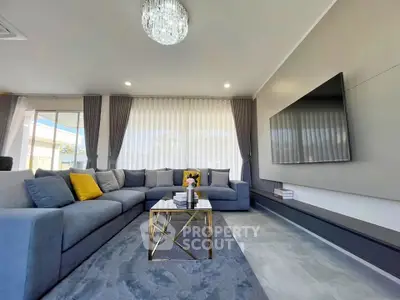 Luxurious modern living room with elegant decor and spacious seating area
