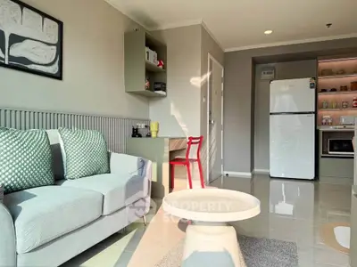 Modern living room with stylish decor and open kitchen layout