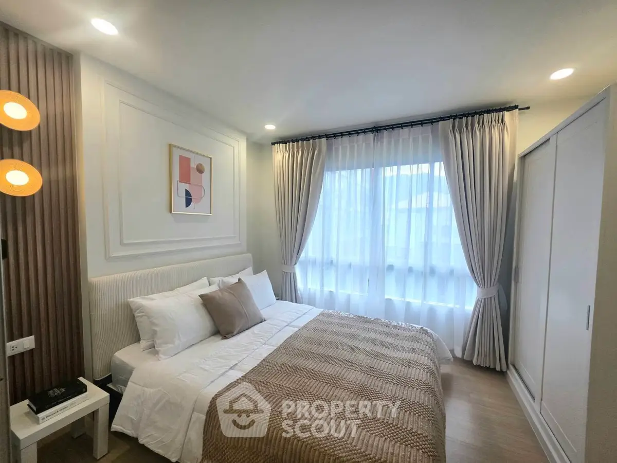 Cozy and elegant bedroom with natural light and modern decor