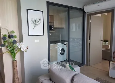Modern apartment interior with washing machine and stylish decor