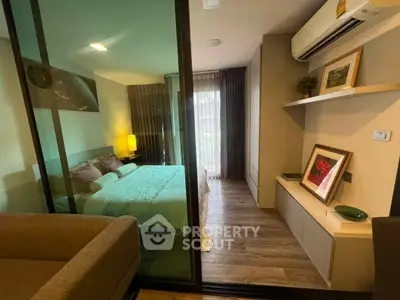 Modern bedroom with glass partition and stylish decor in a cozy apartment