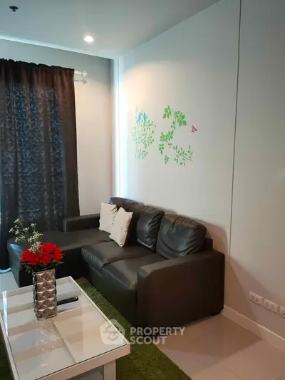 Cozy living room with modern leather sofa and stylish decor