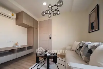 Modern living room with stylish decor and contemporary lighting