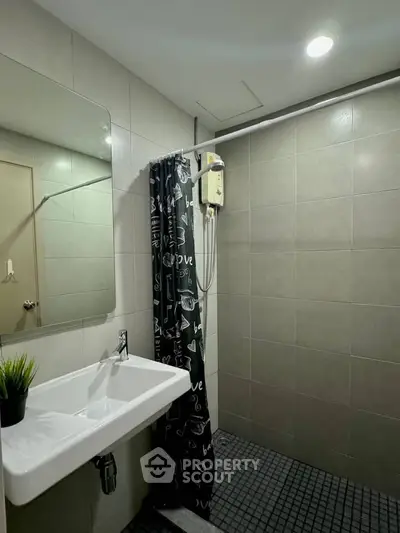 Modern bathroom with sleek shower and stylish decor