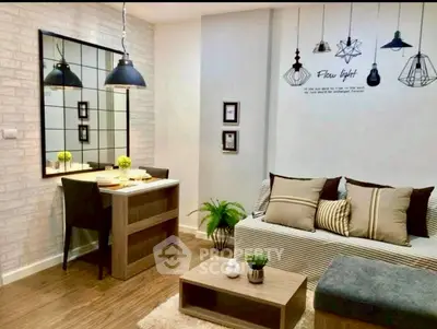 Stylish modern living room with cozy seating and chic lighting fixtures.