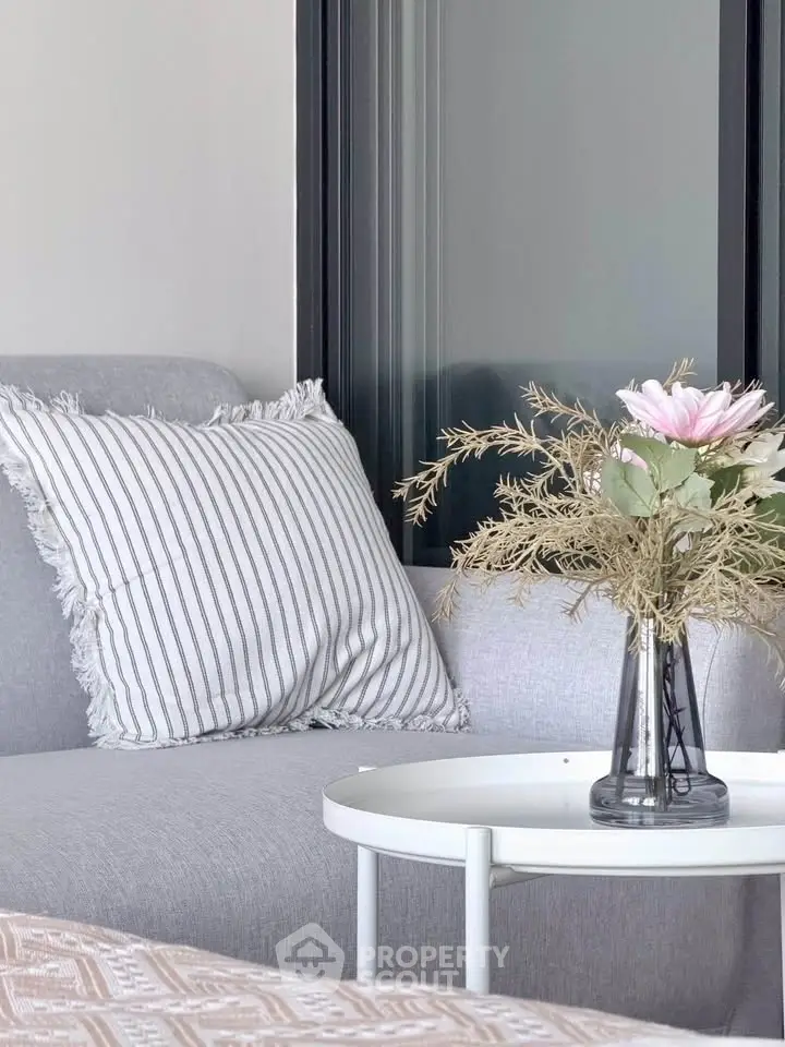 Stylish modern living room with cozy sofa and elegant decor