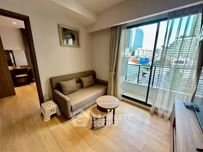 Modern living room with balcony view in urban apartment