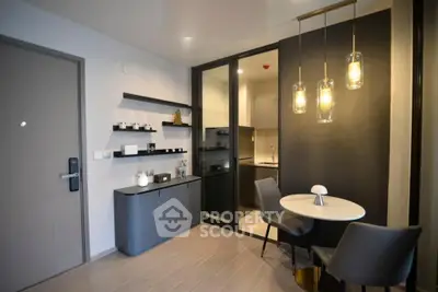 Modern apartment interior with stylish dining area and kitchen view