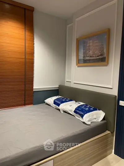 Cozy bedroom with modern decor and stylish wall art