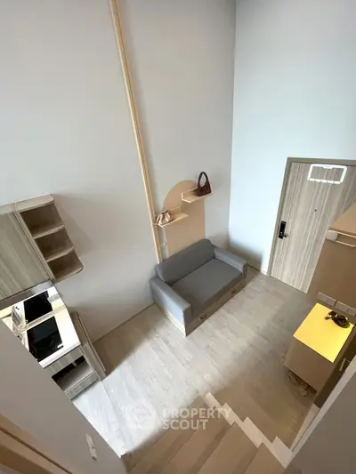 Modern loft-style apartment with high ceilings and minimalist design