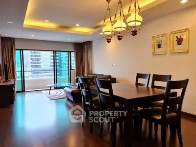 Spacious modern living room with elegant dining area and city view balcony.