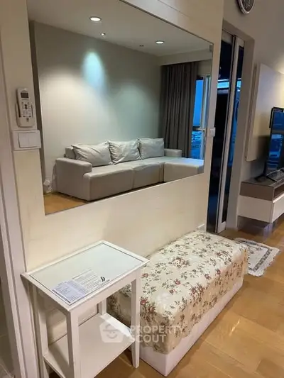 Cozy living room with floral bench and modern decor