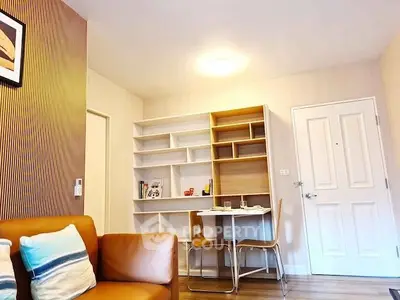 Modern living room with stylish furniture and built-in shelving