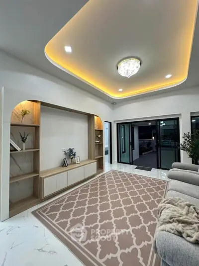 Luxurious living room with elegant ceiling lights and modern decor
