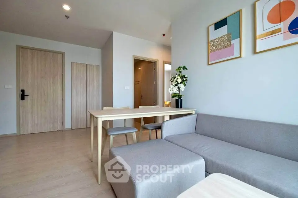 Modern living room with stylish decor and open layout in a contemporary apartment.