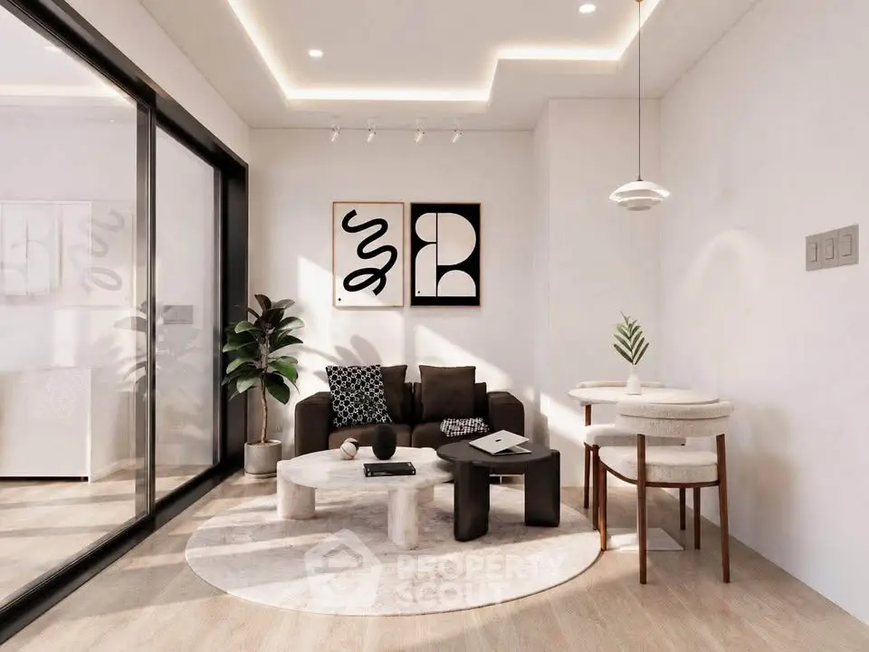 Modern living room with stylish decor, large windows, and cozy seating area.
