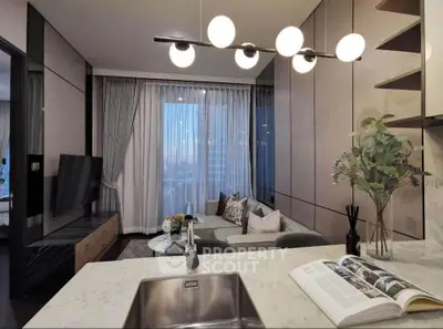 Modern open-layout living room with stylish decor and large windows offering a stunning city view.
