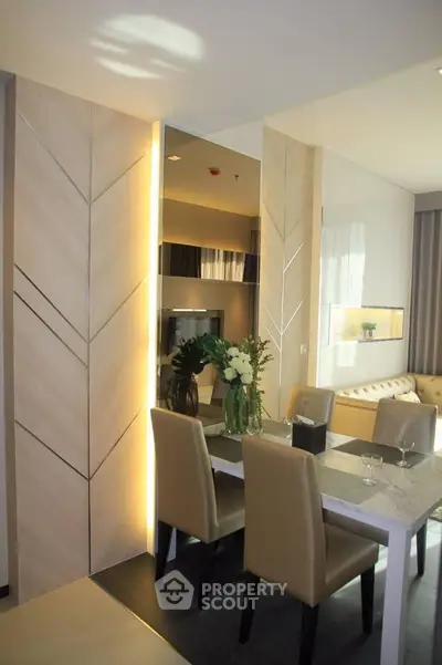 Elegant dining area with modern decor and ambient lighting