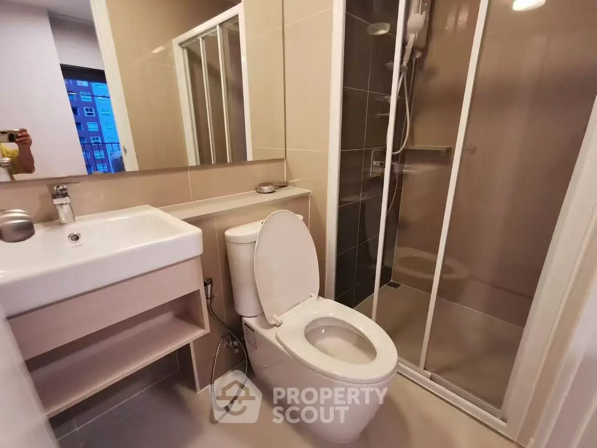 Modern bathroom with sleek shower and contemporary fixtures