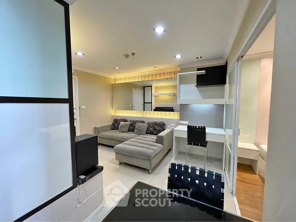 Modern living room with stylish furniture and open layout in a contemporary apartment.