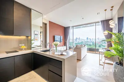 Luxurious open-plan kitchen and living room with stunning city view