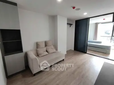 Modern apartment interior with cozy living area and spacious bedroom