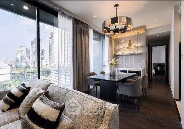Luxurious modern living room with elegant dining area and stunning city view.