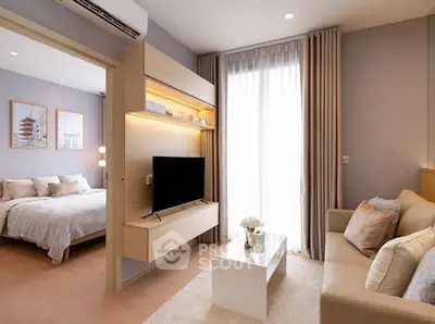 Modern living room with cozy sofa and TV, adjacent to stylish bedroom, featuring elegant decor and natural light.