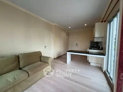 Spacious living room with modern kitchen in open layout apartment