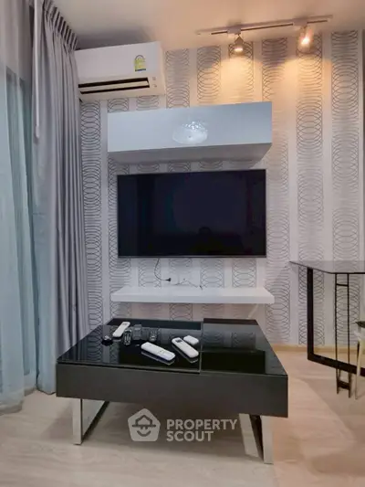 Modern living room with sleek TV setup and stylish decor