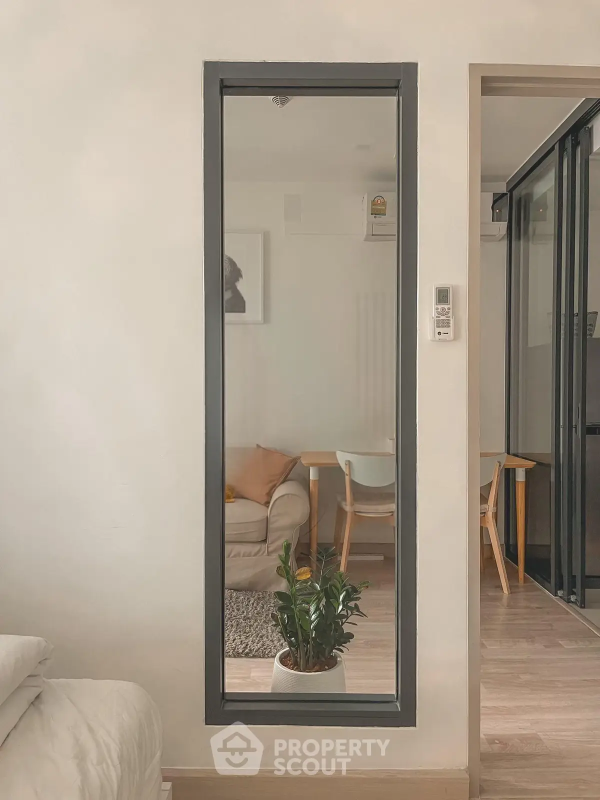 Modern living space with stylish decor and cozy seating area, perfect for urban living.