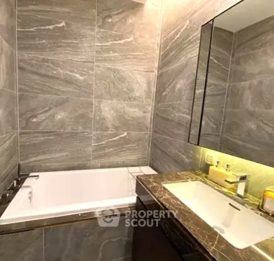 Luxurious bathroom with elegant marble tiles and modern fixtures